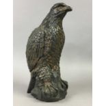 A RESIN FIGURE OF AN EAGLE AND OTHER OBJECTS