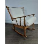 A JOYNSON HOLLAND ROCKING CHAIR AND MATCHING ARMCHAIR