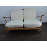 AN ERCOL SOFA AND MATCHING CHAIR