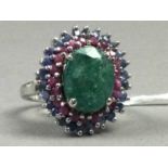 AN EMERALD, RUBY AND SAPPHIRE RING