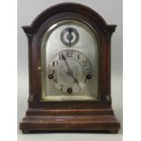 A MAHOGANY MANTEL CLOCK