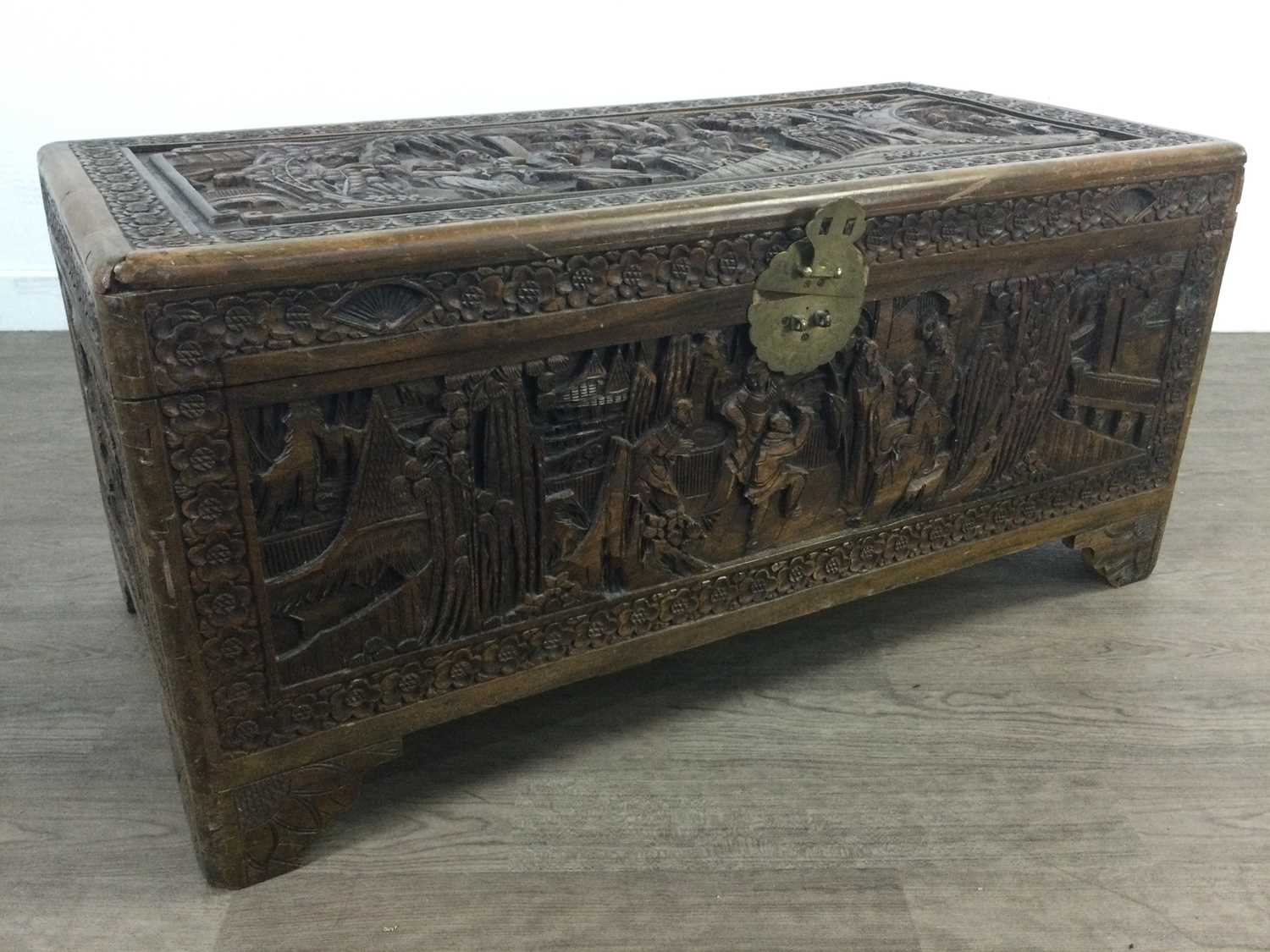 A CARVED CHINESE CAMPHORWOOD CHEST