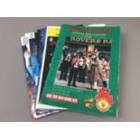 A GROUP OF FOOTBALL PROGRAMMES