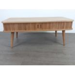 AN OAK MID-CENTURY STYLE COFFEE TABLE AND A NEST OF THREE TABLES