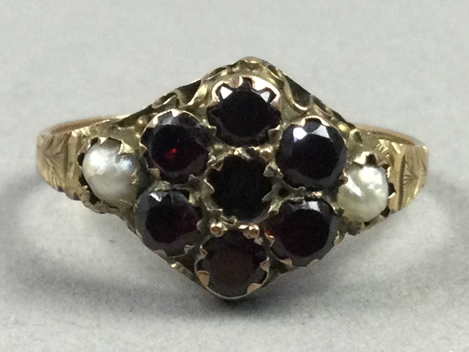 A GARNET AND PEARL RING