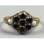A GARNET AND PEARL RING