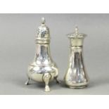 TWO SILVER PEPPER POTS, ALONG WITH SPOONS