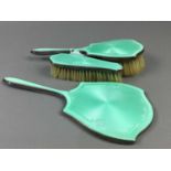 AN EARLY 20TH CENTURY SILVER AND GREEN GUILLOCHE ENAMEL VANITY SET