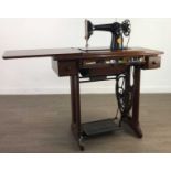 A SINGER SEWING MACHINE TREADLE