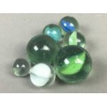 GROUP OF MARBLES AND TEA POT HANDLES