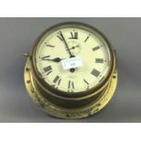 A BRASS SMITH'S BULKHEAD CLOCK