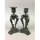 A PAIR OF REGENCY BRONZE CANDLESTICKS