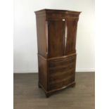 A MAHOGANY REPRODUCTION SERPENTINE CABINET ON CHEST