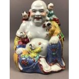 A 20TH CENTURY CHINESE POLYCHROME BUDDHA AND FURTHER ASIAN ITEMS