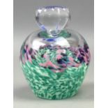 A CAITHNESS GLASS PAPERWEIGHT AND PERFUME FLASK
