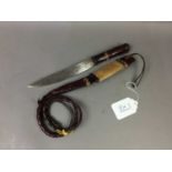 A COMBINATION KNIFE/WHIP AND SWORD