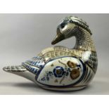 A CERAMIC MODEL OF A DUCK