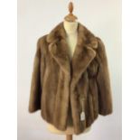 A LADY'S VINTAGE FUR JACKET