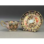 A ROYAL CROWN DERBY CUP AND SAUCER AND OTHER TEA WARE