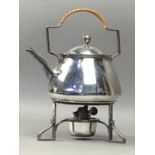 AN ARTS & CRAFTS SILVER PLATED KETTLE ON STAND
