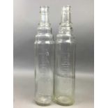 A PAIR OF EARLY 20TH CENTURY ESSO LUBE GLASS BOTTLES
