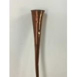 A COPPER HUNTING HORN AND A RIDING CROP