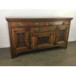 A LATE VICTORIAN OAK SIDEBOARD