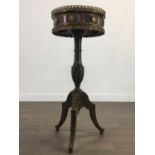 A LOUIS XIV STYLE DRUM TABLE