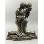 A BRONZED RESIN FIGURE OF TWO LOVERS AND OTHER ITEMS