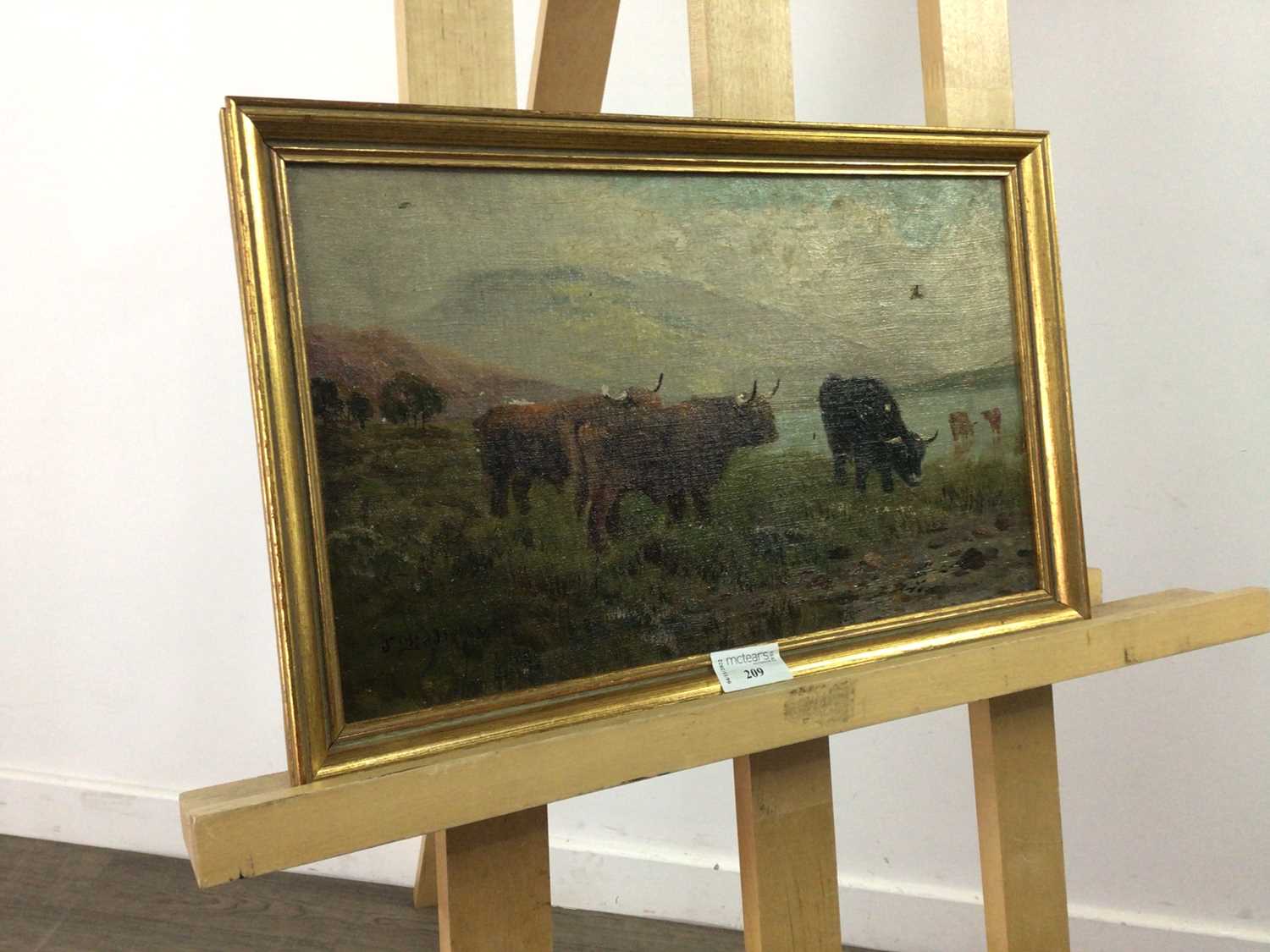 AN OIL PAINTING OF HIGHLAND CATTLE BY J. MIDDLETON