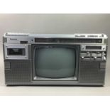 A PANASONIC PORTABLE TV WITH STEREO CASSETTE RECORDER