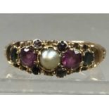 A VICTORIAN PEARL AND GEM SET RING