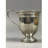 A SILVER CHRISTENING MUG, SILVER BACKED MIRROR AND BRUSH, AND SILVER VASE