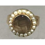 A VICTORIAN GOLD AND PEARL CLUSTER RING