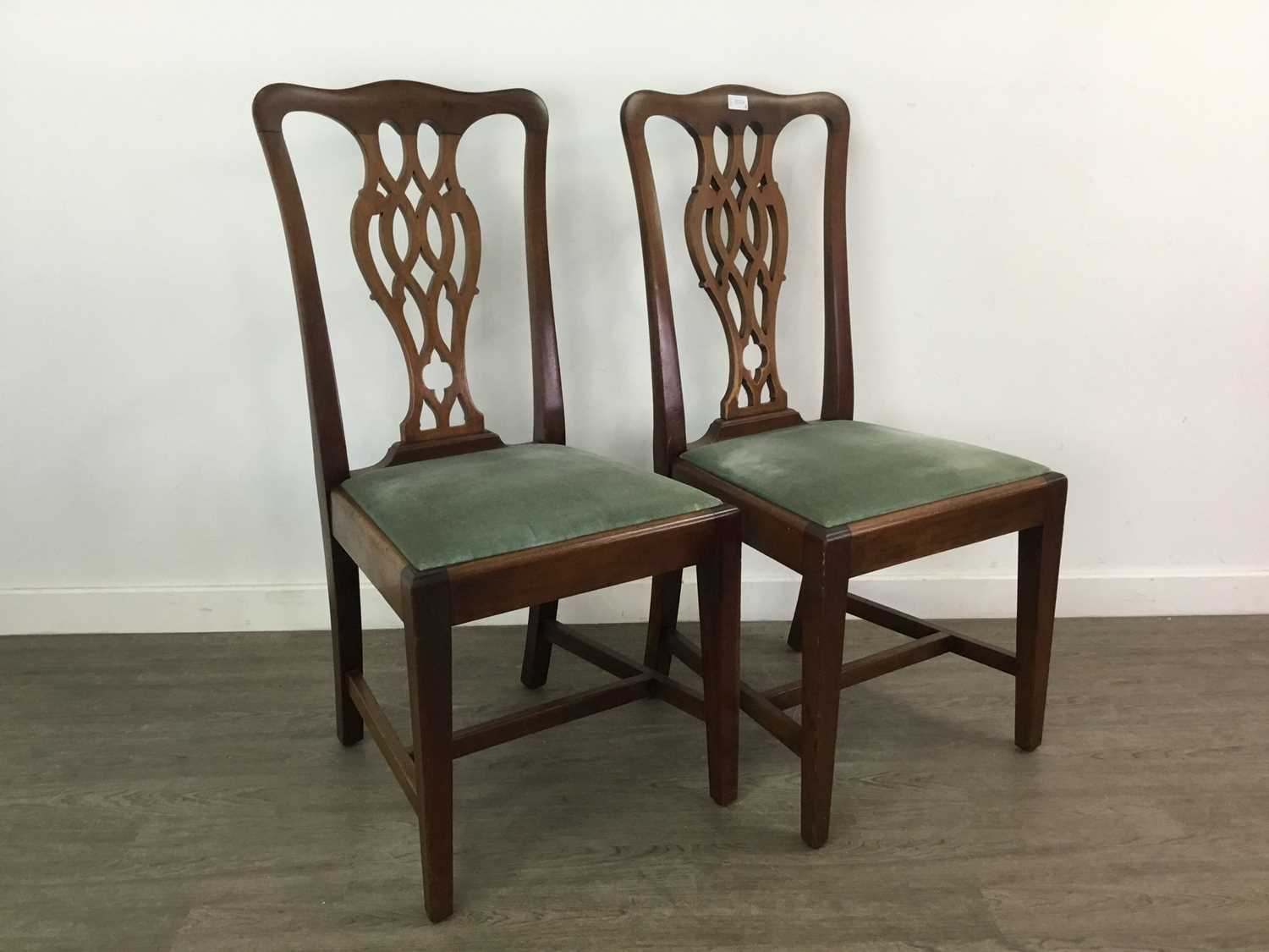 A SET OF SIX CHIPPENDALE STYLE MAHOGANY DINING CHAIRS