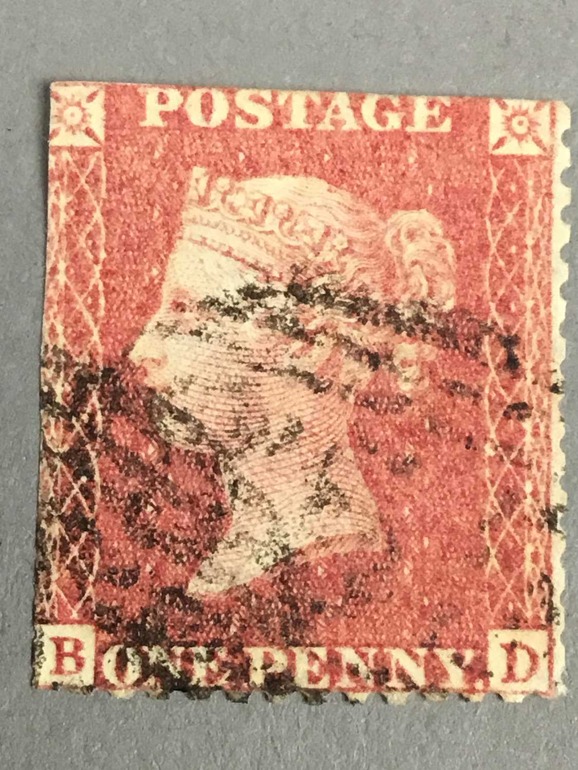 AN ALBUM AND SHEET OF VICTORIAN STAMPS