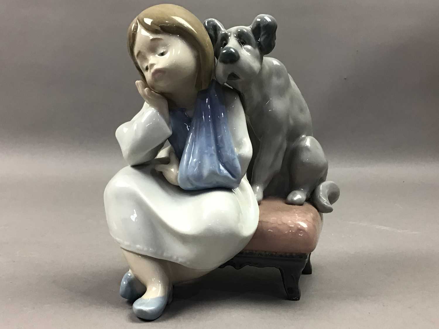 A LLADRO FIGURE OF 'WE CAN'T PLAY' AND OTHER FIGURES