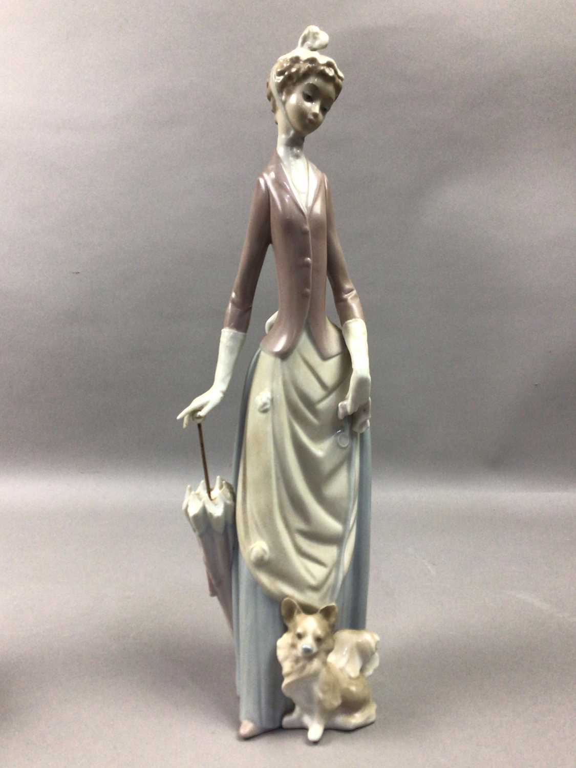 A LLADRO FIGURE OF A FEMALE WITH PARASOL AND TWO OTHERS
