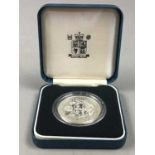 A ROYAL MINT SILVER PROOF CROWN AND TWO OTHERS