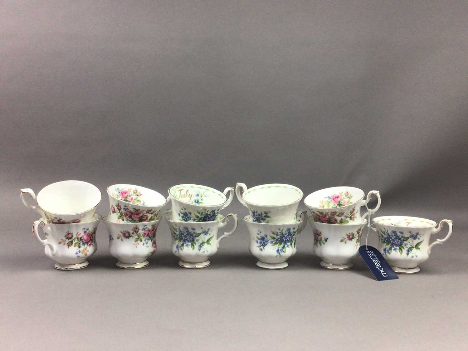 A ROYAL ALBERT MOSS ROSE TEA SERVICE AND FORGET-ME-NOT CUPS AND SAUCERS - Image 2 of 3