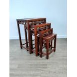 A NEST OF FOUR CHINESE HARDWOOD OCCASIONAL TABLES