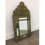 A 19TH CENTURY BRASS WALL MIRROR