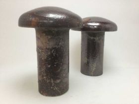 A PAIR OF INDUSTRIAL STONEWARE VENT COVERS