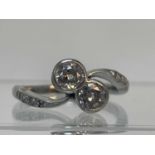 A DIAMOND TWO STONE RING