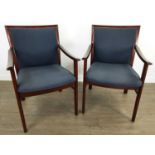 A PAIR OF STAINED WOOD FRAMED ARMCHAIRS