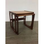 A MID-CENTURY TEAK NEST OF TWO TABLES