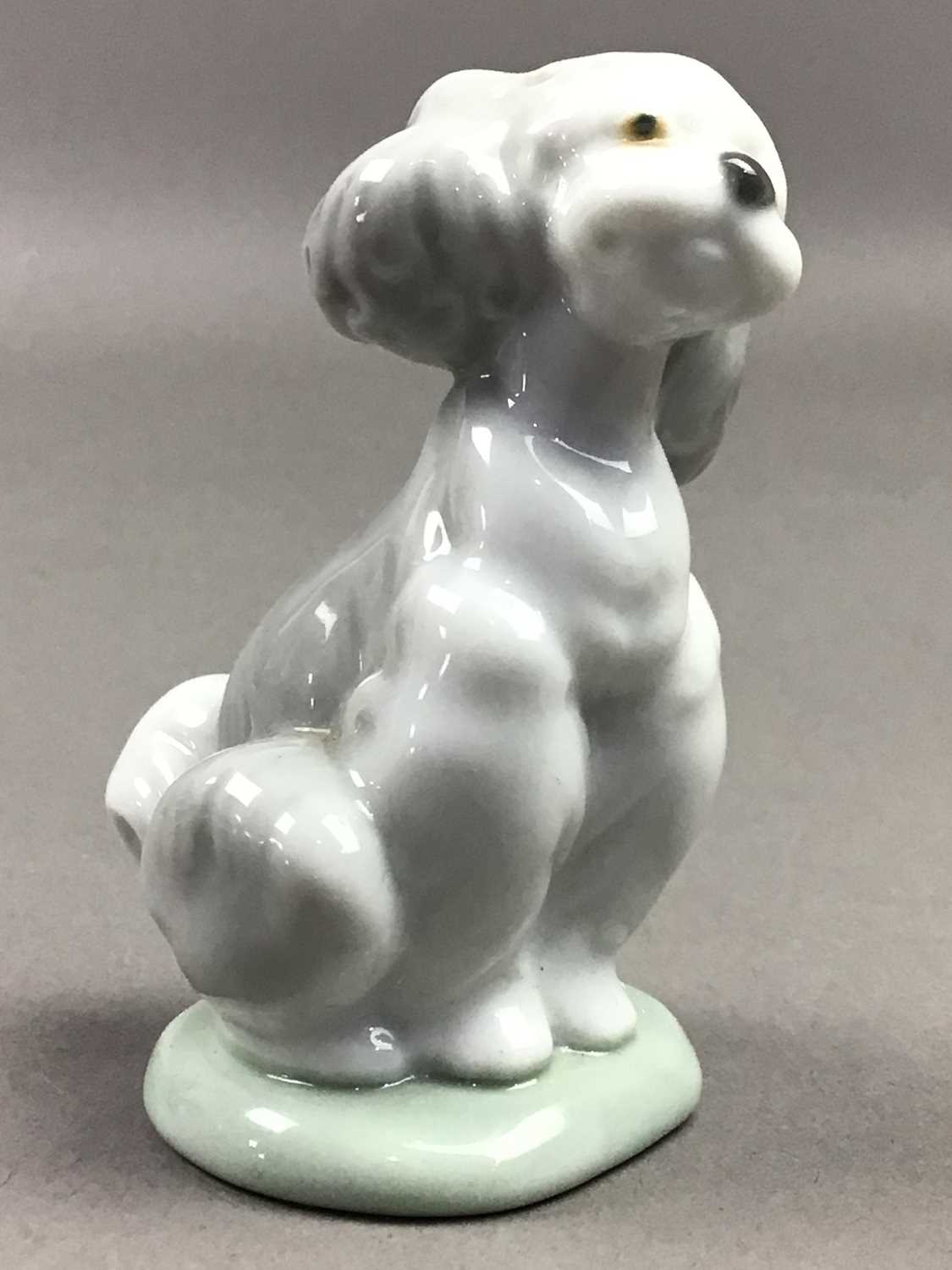 A LLADRO MODEL OF A DOG, A DOULTON FIGURE OF A GIRL AND A HUMMEL FIGURE