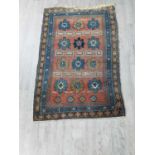 A SMALL EARLY 20TH CENTURY CAUCASIAN RUG