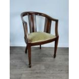 A MAHOGANY DRAWING ROOM ARMCHAIR AND A COFFEE TABLE