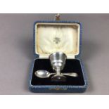 A SILVER CHRISTENING SET, CASED CUTLERY AND NAPKIN RINGS